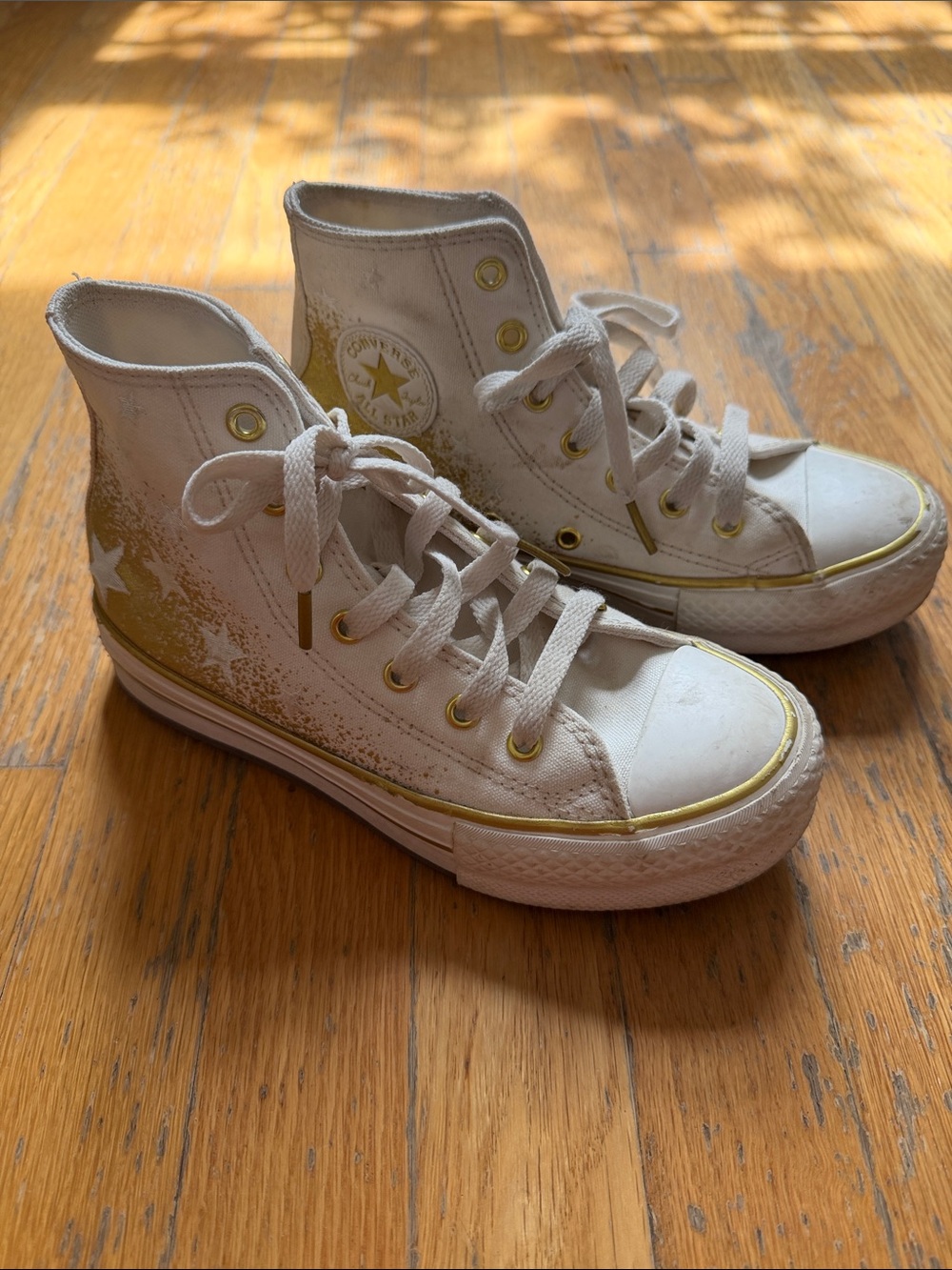 Gold Converse Hightop Sneakers